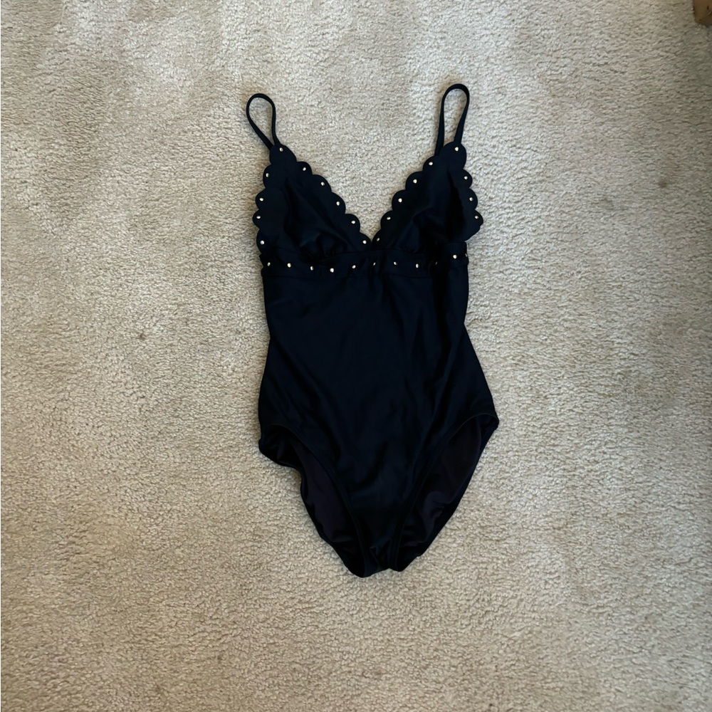 Grungy black one piece swimsuit with metal detailing